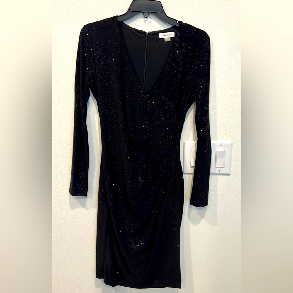 Very flattering black formal dress.